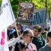 Geneva civil servants march against planned budget cuts