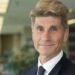 Former U of Manitoba law dean disbarred in U.K., still under Canada-wide arrest warrant