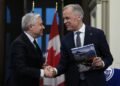 Liberals, Conservatives haggle over a deficit that is both smaller and larger