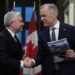 Liberals, Conservatives haggle over a deficit that is both smaller and larger