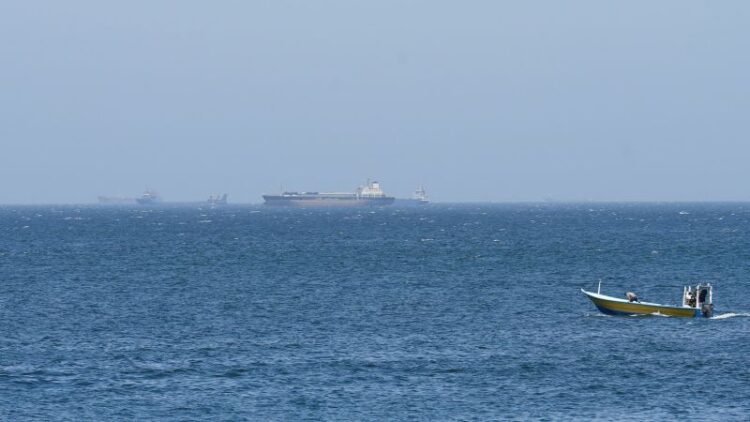 Ships still aren’t going through the Strait of Hormuz. Here’s what it will take to get things going again
