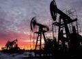 Oil rises nearly 3% as Hormuz risks offset UAE Opec exit