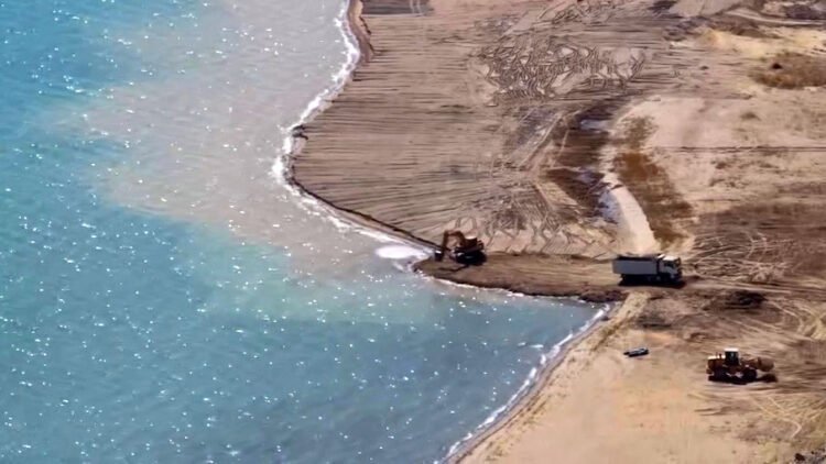 The deputy asks to check which government agency allowed construction companies to dump soil from dug pits into Lake Issyk-Kul
