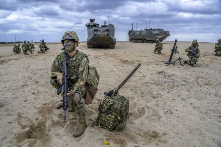 In major policy shift, Japan scraps limits on lethal arms exports