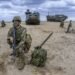 In major policy shift, Japan scraps limits on lethal arms exports