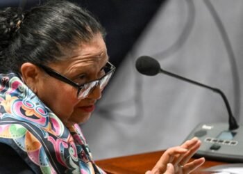 The attorney general fights for her position