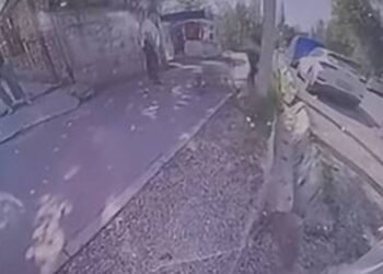 A teenager on a scooter hits a pregnant woman on the sidewalk in Bishkek