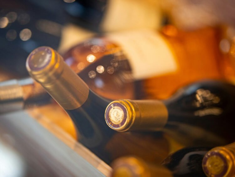 Shooting at Trump event: Woman collects wine bottles
