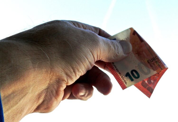What is the average expected salary in Latvia in 2026?