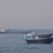 Iranian oil tankers are clustering just shy of US blockade line