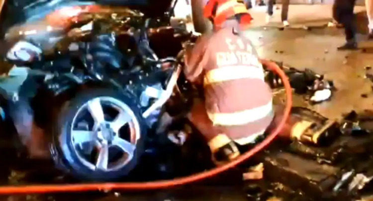 Car demolishes road dividers, crashes into pole and catches fire; PMT reports three injuries