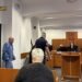 The roommate shot him in the head, then locked the corpse in the kitchen and drank Premium vodka for days