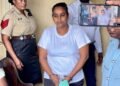 Mother of strangled 7-year-old remanded to prison for murder