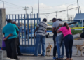 Trinidad police officer murdered in station, 68 guns taken