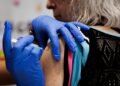 CDC delays report showing covid vaccine benefits, scientists say