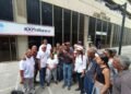Union representatives call for a mobilization to the US embassy on April 16