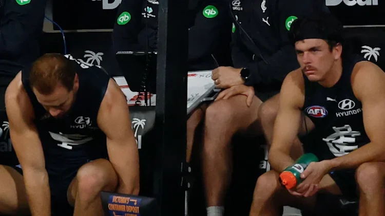 Elijah Hollands mental health episode: AFL club psychologist defends Carlton, says spending caps put players at risk