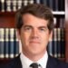 One of the observers that the Government placed in the AFA resigned