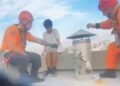 Firefighters saved a young man who sat on a ledge and threatened to jump from the 13th floor