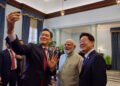 Lee takes selfies with Indian PM Modi, Samsung chairman with Galaxy phone