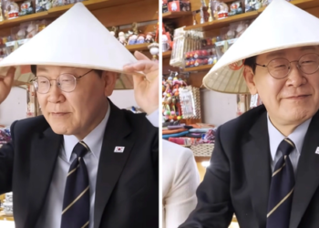 South Korea’s president dons conical hat, samples durian on Hanoi streets