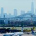A United Airlines plane caught a wheel on a truck and a pole while landing