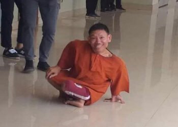 Wheelchair-bound activist jailed 18 months for incitement