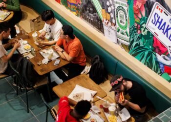 Quick service restaurants are taking a bigger hit as Canadians feel crunched by the cost of living