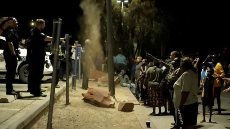 Fury over young girl’s killing in Australia sparks vigilante justice and violent clashes with police