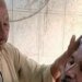 A 70-year-old story of struggle… The oldest barber in Qena clings to a pair of scissors and a chair he inherited from his father