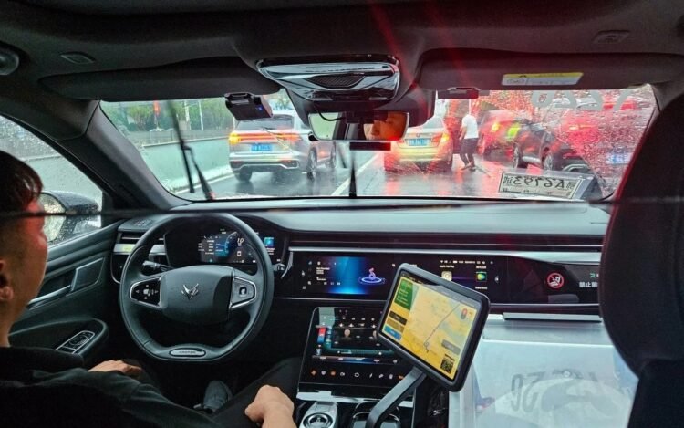 China suspends robotaxi licensing