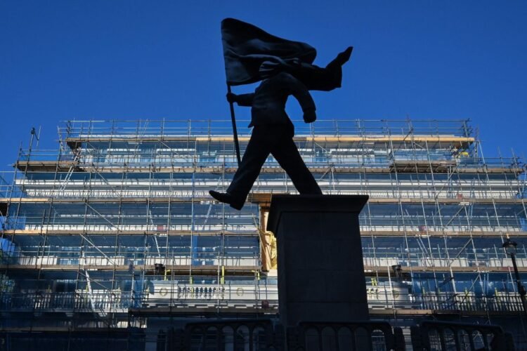 Banksy confirms a new statue in London of a man blinded by a flag is his work
