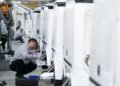 Manufacturing defies Mideast energy shock