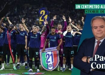 One centimeter at a time by Paolo Condò | Inter with arms raised