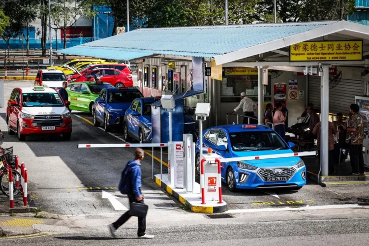 Grab app launches cross-border taxis to Johor Bahru