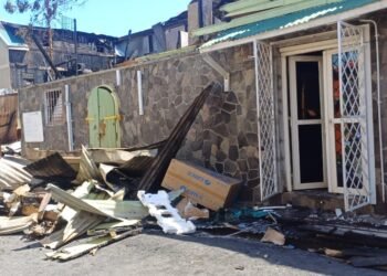 One in custody following massive fire in Roseau