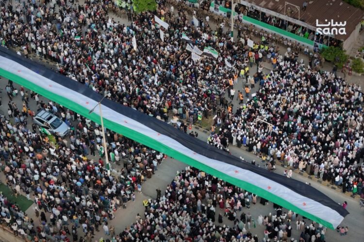 Residents of Banias commemorate martyrs of 2013 massacres, demand justice