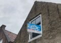 House prices rose 5% in the year to March as market levels off