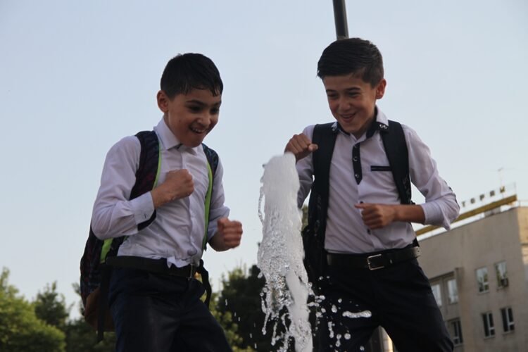 When will summer holidays for schoolchildren and students begin in Tajikistan?