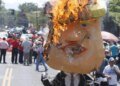 Figure of Donald Trump burned during Labor Day march in SPS