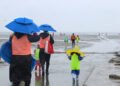Rain, gusty winds expected through Monday morning
