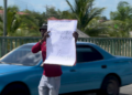 Belizean Artist Disrupts Traffic to Deliver a Defiant Message