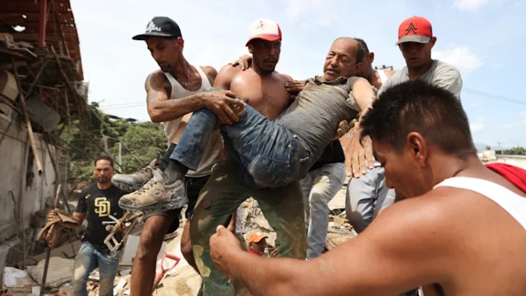 Venezuela earthquake: Desperate search for survivors as death toll climbs, thousands injured