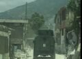 The police enter Village de Dieu, stronghold of the Izo 5 segonn gang