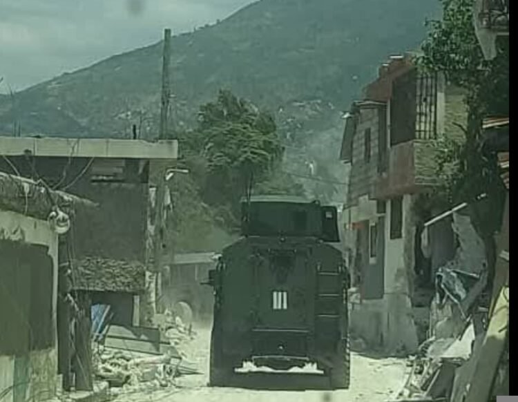 The police enter Village de Dieu, stronghold of the Izo 5 segonn gang