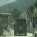 The police enter Village de Dieu, stronghold of the Izo 5 segonn gang