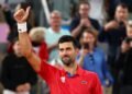 PHOTO | Djokovic unfurled the black and white flag at the finish line after Hamilton’s victory in Barcelona