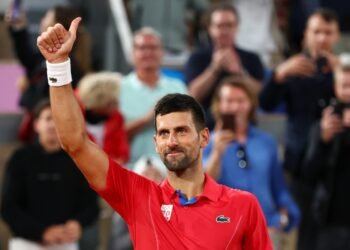 PHOTO | Djokovic unfurled the black and white flag at the finish line after Hamilton’s victory in Barcelona