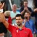 PHOTO | Djokovic unfurled the black and white flag at the finish line after Hamilton’s victory in Barcelona