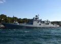 A Russian warship fires defensive missiles at Britain